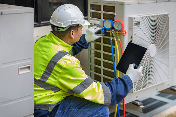 Professional Emergency Ac Repair technician working in Spring Brook, NY